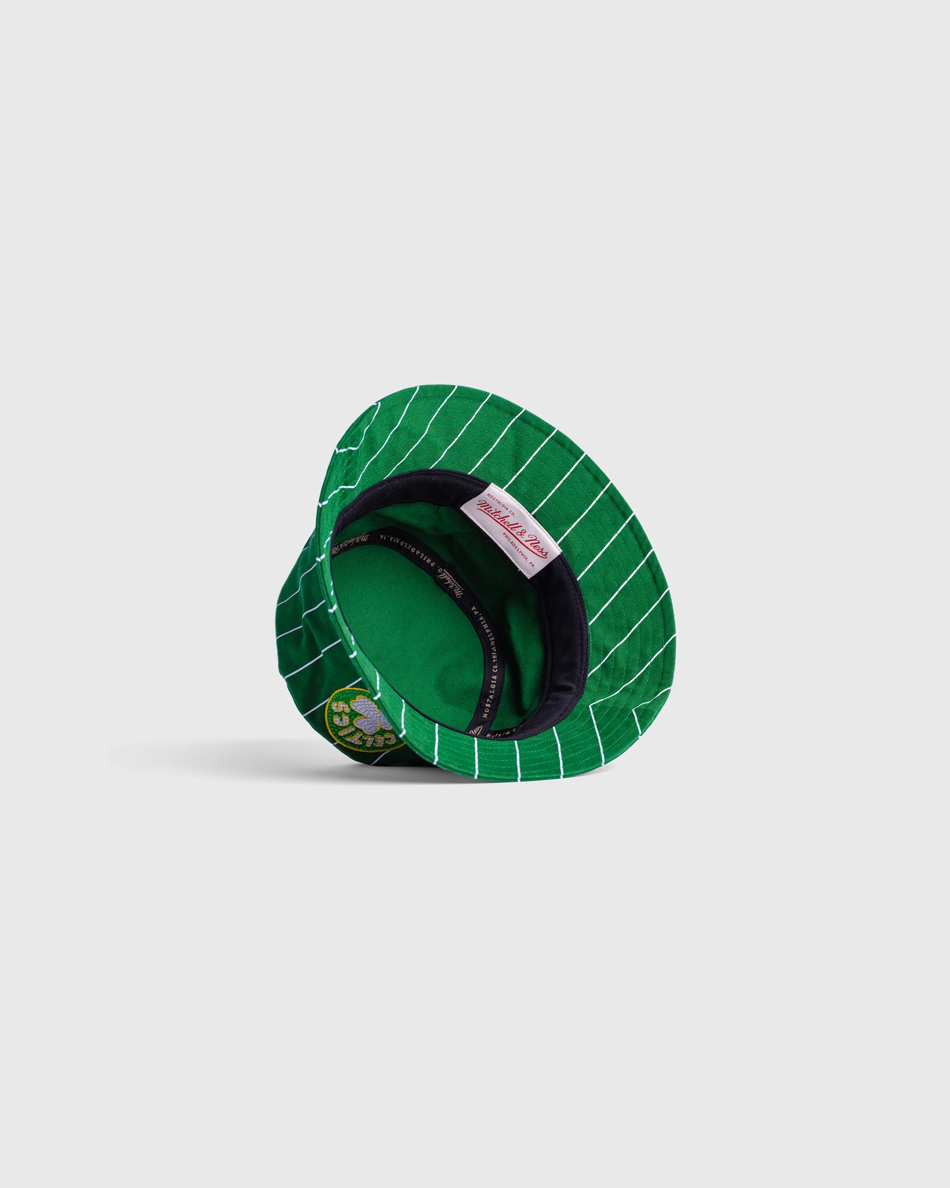 Green Boston Celtics bucket hat with white pinstripes and embroidered team logo, NBA licensed