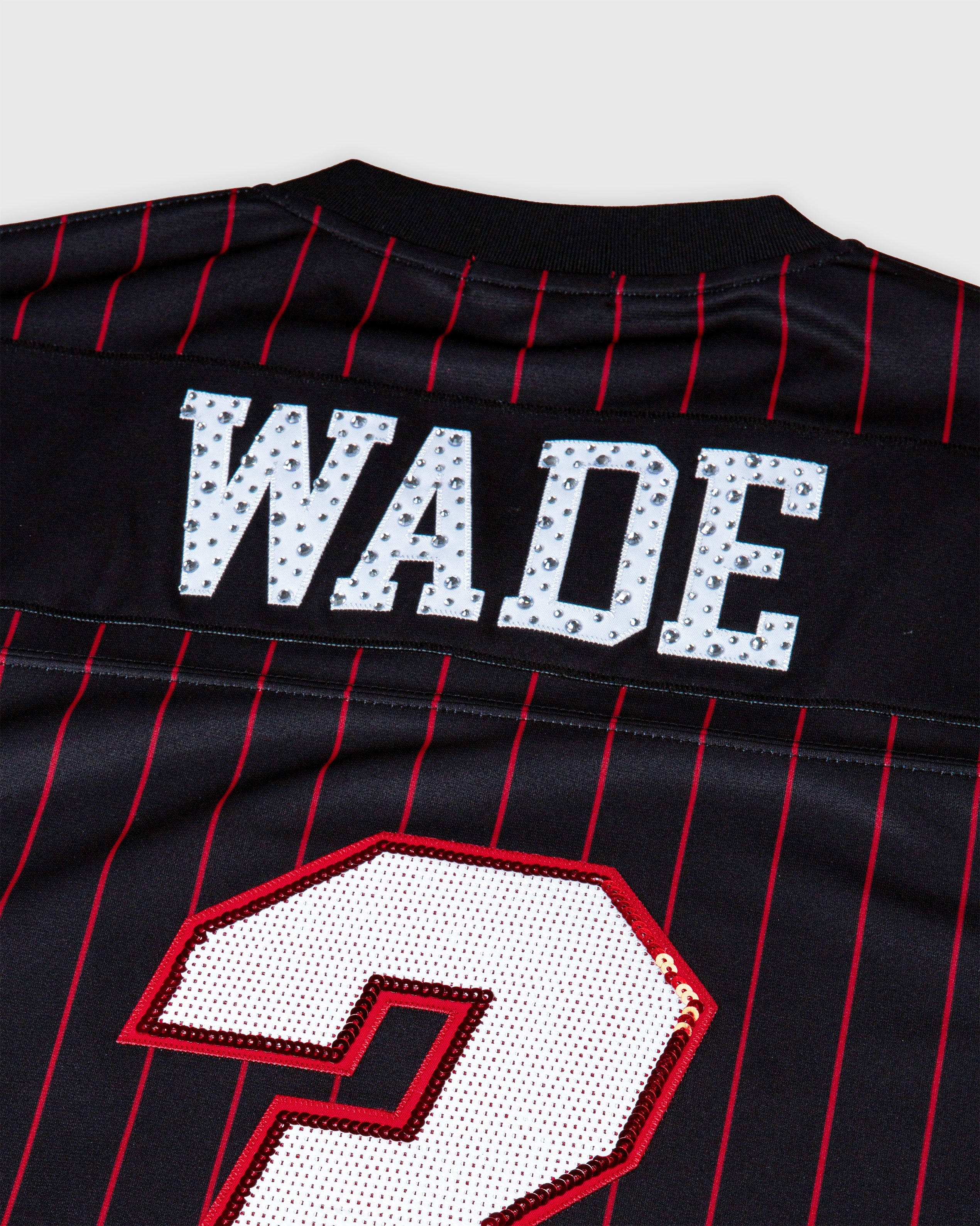 Dwyane Wade Miami Heat cropped football jersey with rhinestone number 3 on black and red pinstripe fabric
