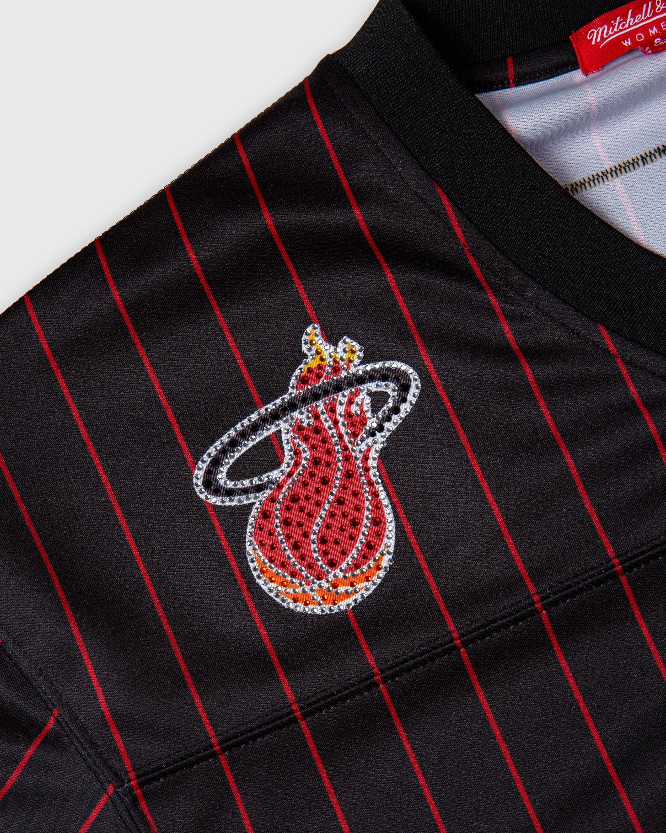 Dwyane Wade Miami Heat rhinestone embellished black and red crop football jersey close-up