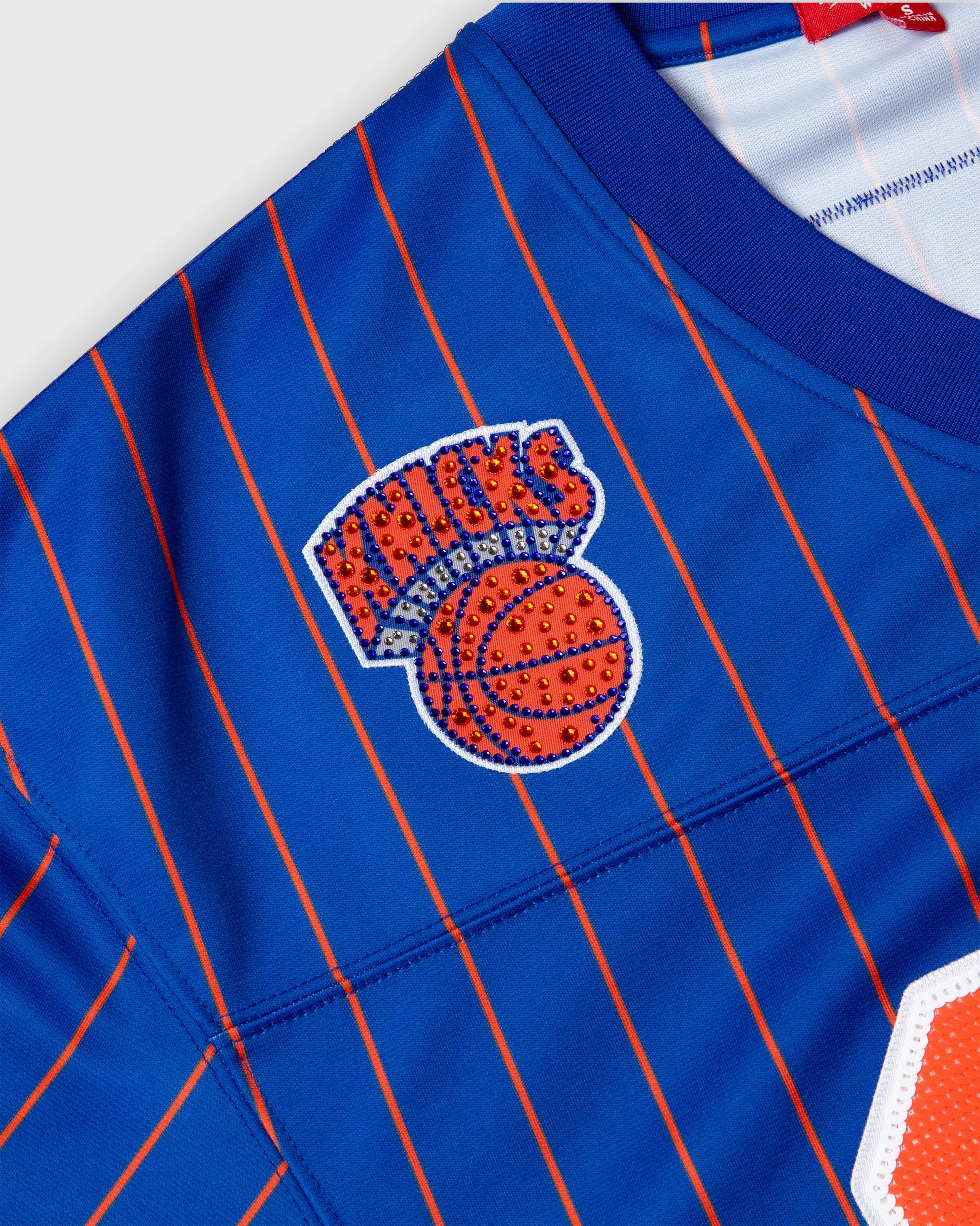 Patrick Ewing New York Knicks Rhinestone Crop Football Jersey with blue and orange pinstripes and embellished logo