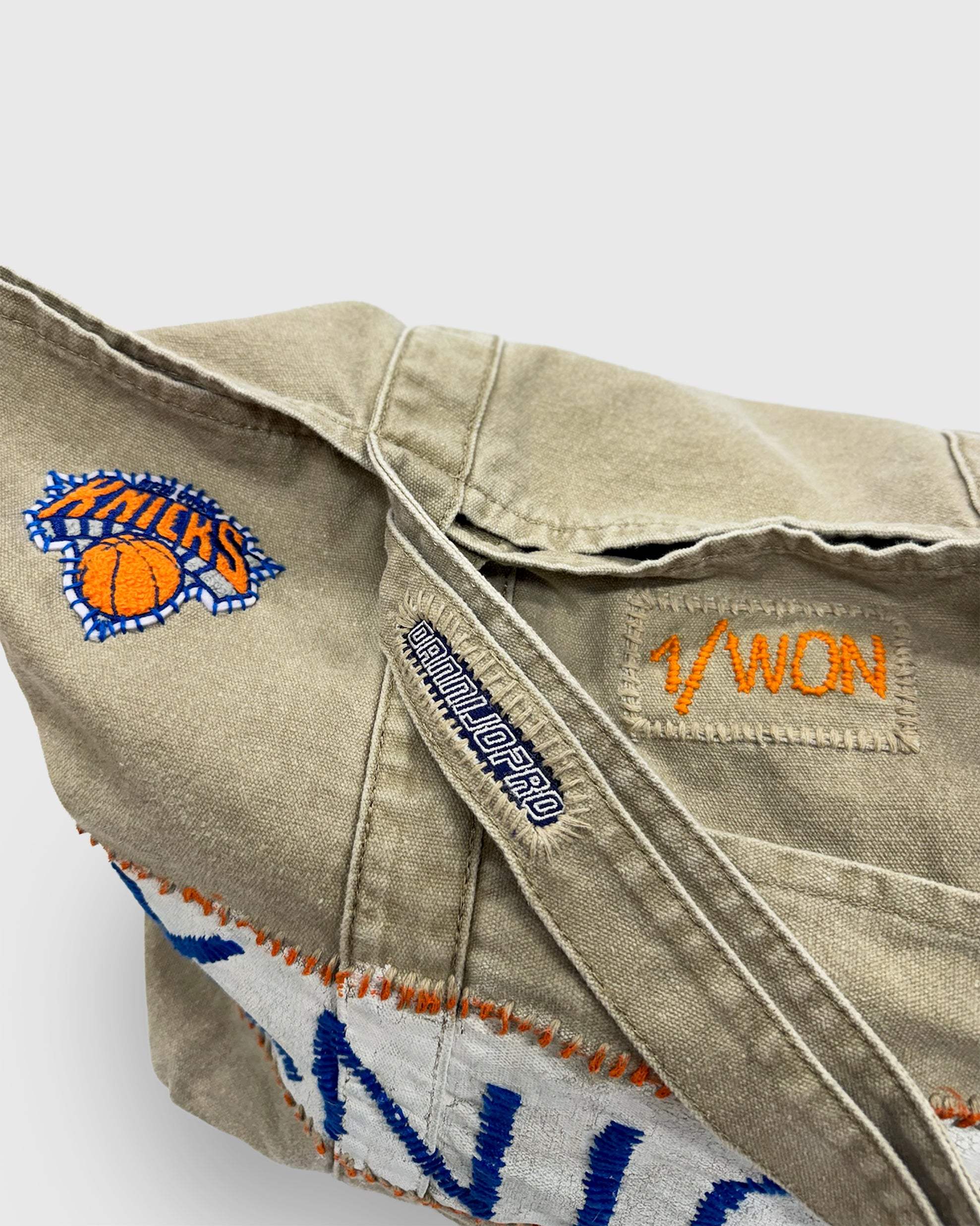 Hand-stitched 1/WON Knicks Bag with NBA logo, distressed beige tote perfect for market, beach, or gym use
