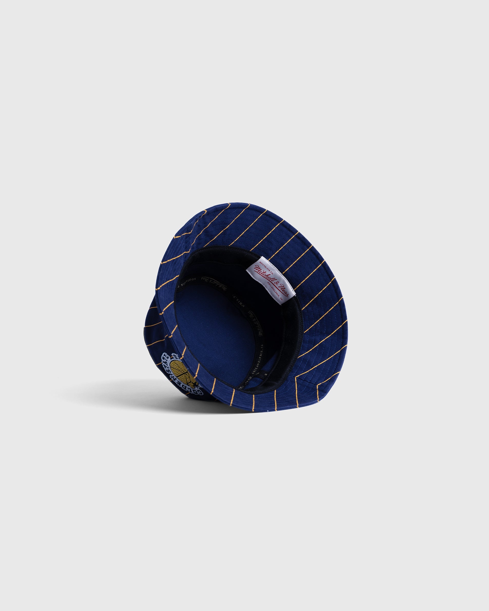 Golden State Warriors navy pinstripe bucket hat with embroidered team logo, NBA licensed game-day accessory