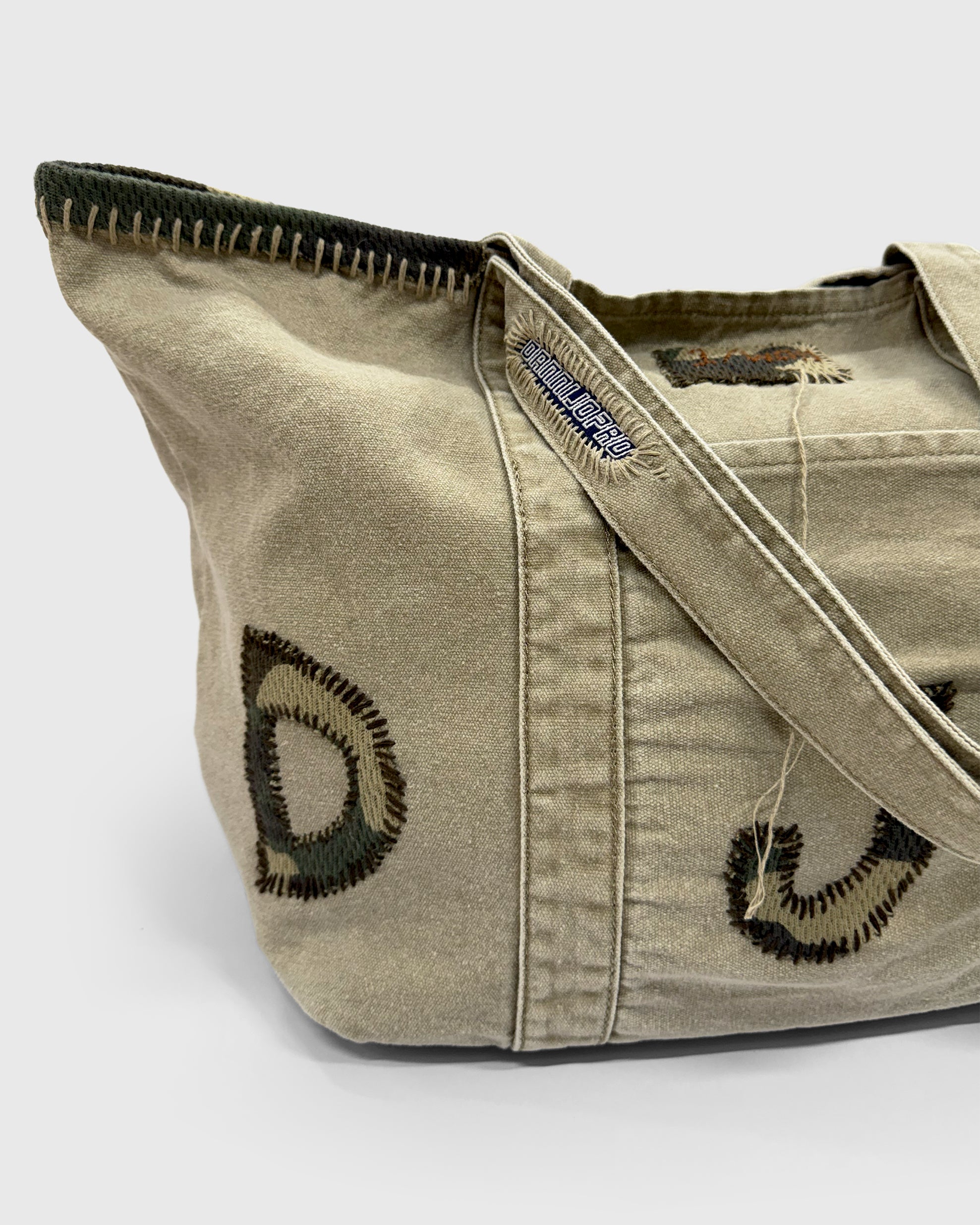 The Camo Initial Bag