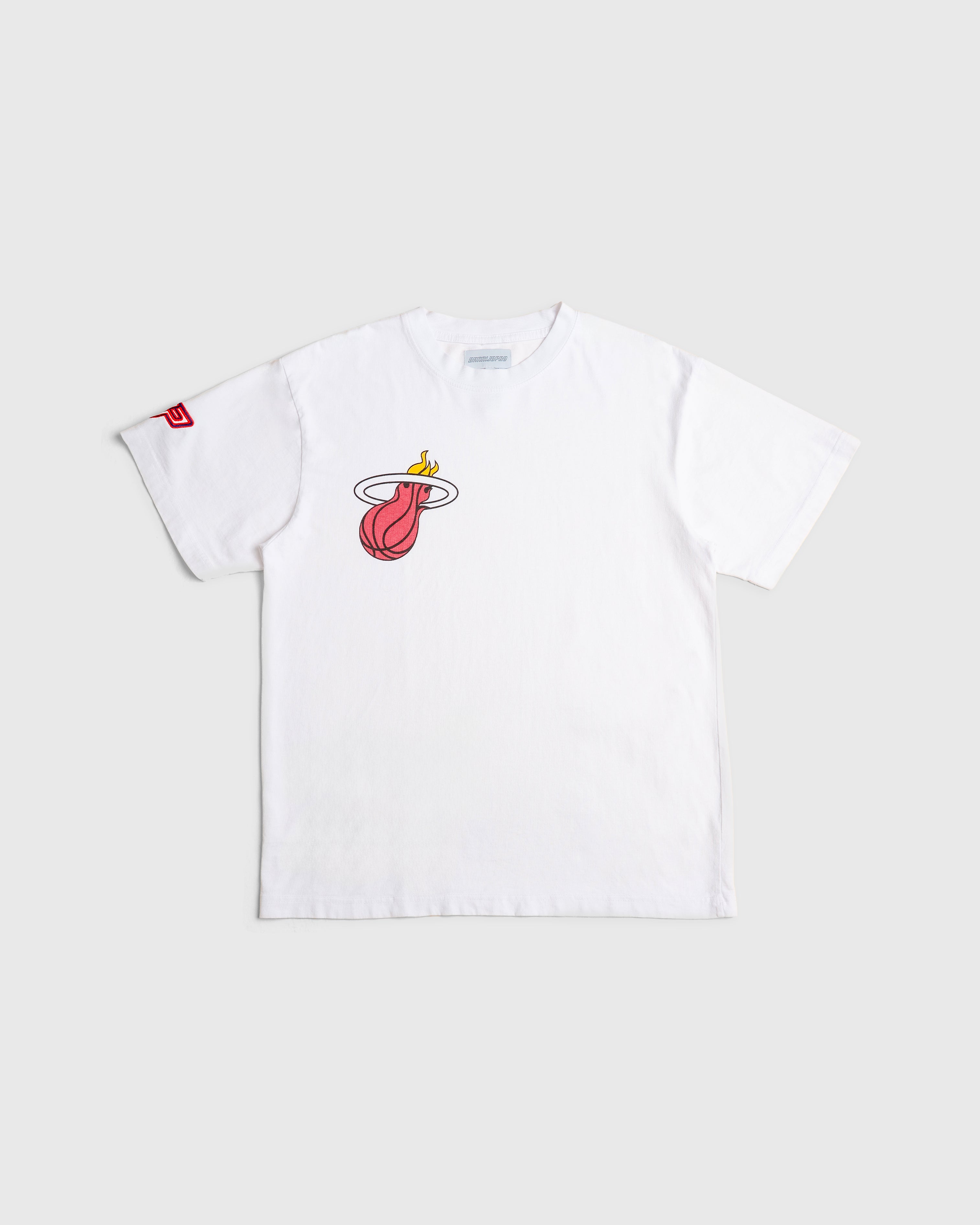 A white crew-neck t-shirt with the Miami Heat logo on the front